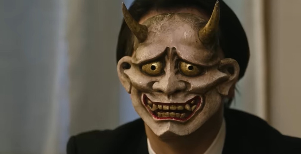 A scene from Demon City (2025) featuring a masked man