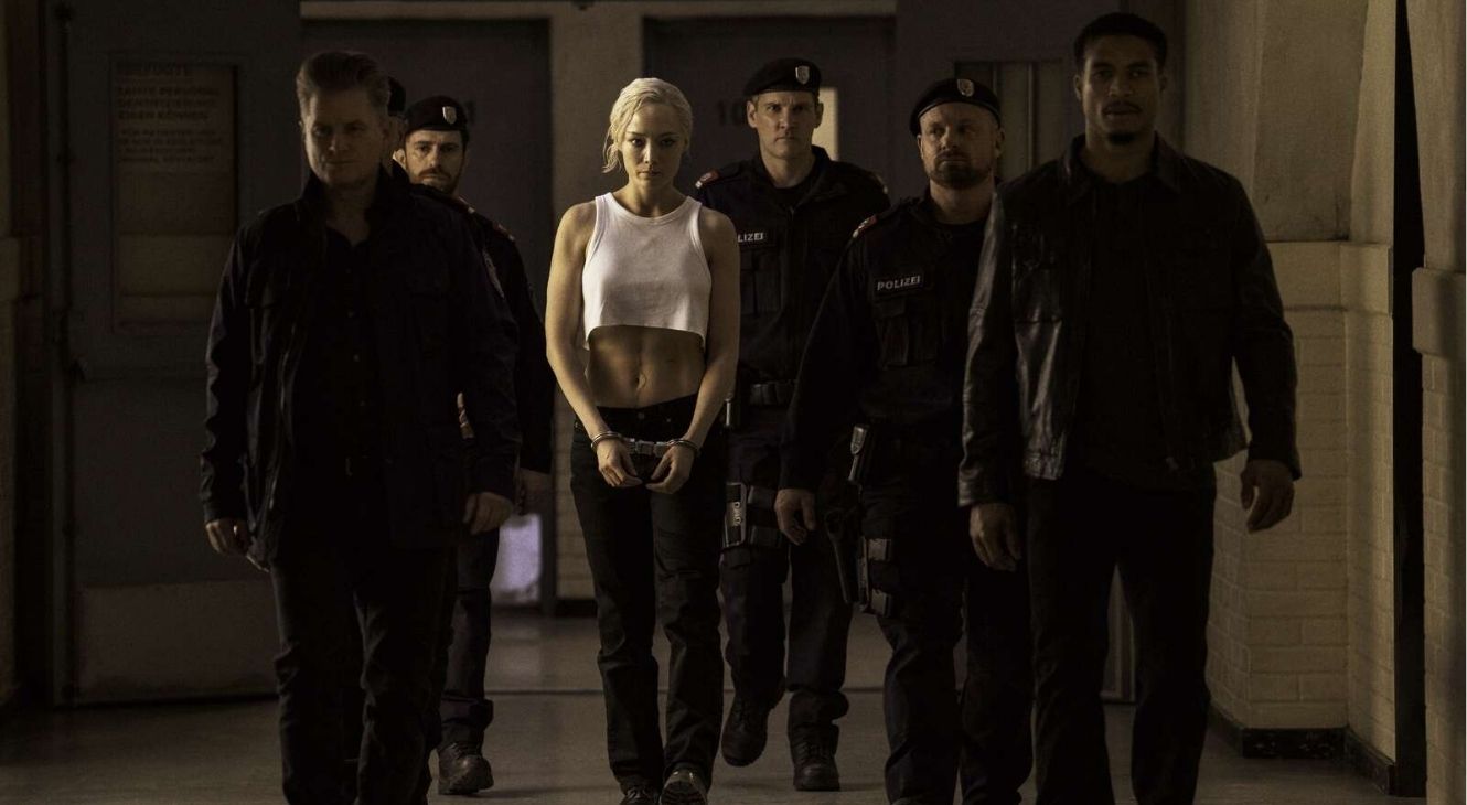 Mission: Impossible — The Final Reckoning promotional image with Pom Klementieff's Paris being escorted by Degas and Briggs