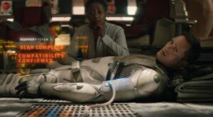 An image of Mensah and Murderbot from the Apple Tv+ show Murderbot, an adaptation of The Murderbot Diaries first book All Systems Red