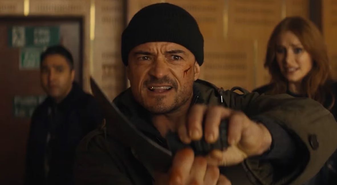 Deep Cover (2025) key art with Nick Mohammed, Bryce Dallas Howard, and Orlando Bloom