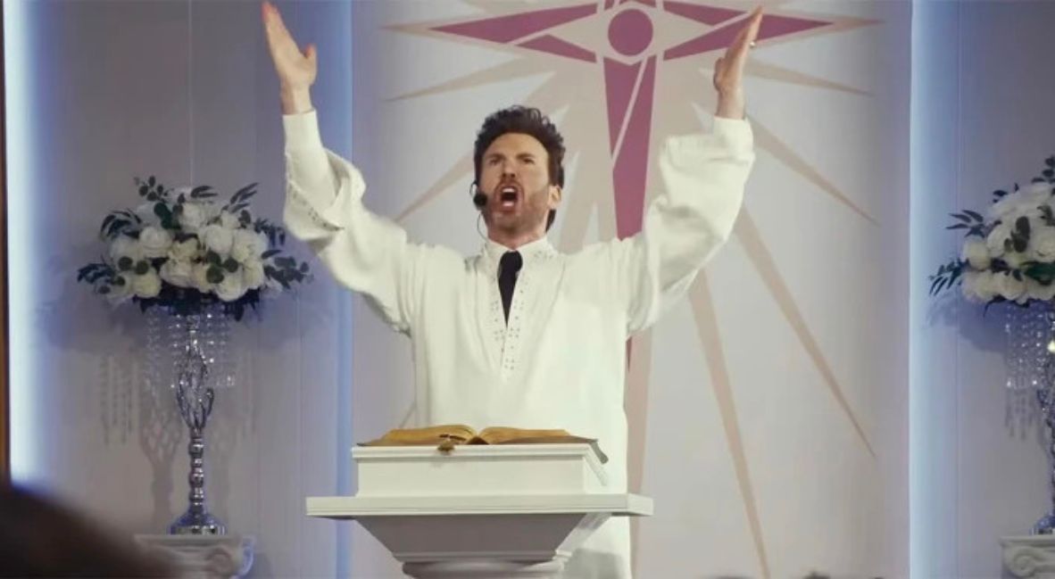 Chris Evans stars as Reverend Drew Devlin in the film Honey Don't