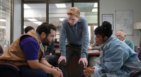 REVIEW: ‘The Paper’ Season 1 Lacks Conviction Travis, Ned (Domnhall Gleeson), and Adelola in Season 1 of The Paper