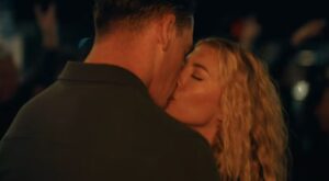 Chris Smith and Emilia Harcourt kissing in Peacemaker Season 2 Episode 8