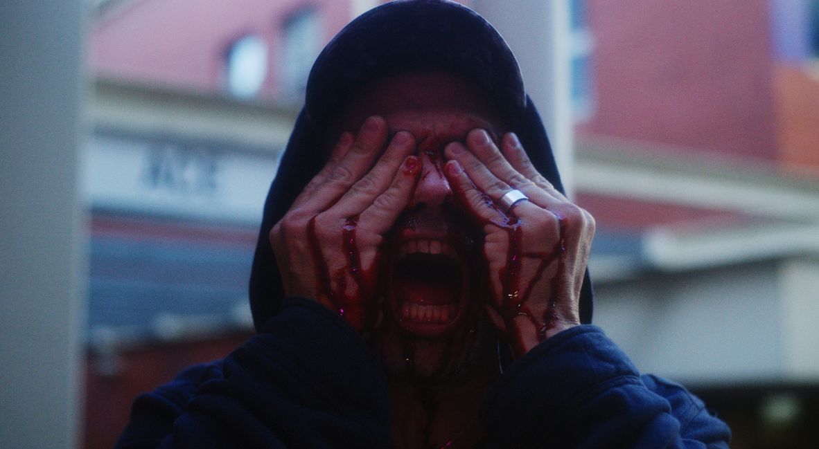 A random mugger being attacked psychically, in the film The Serpent's Skin 