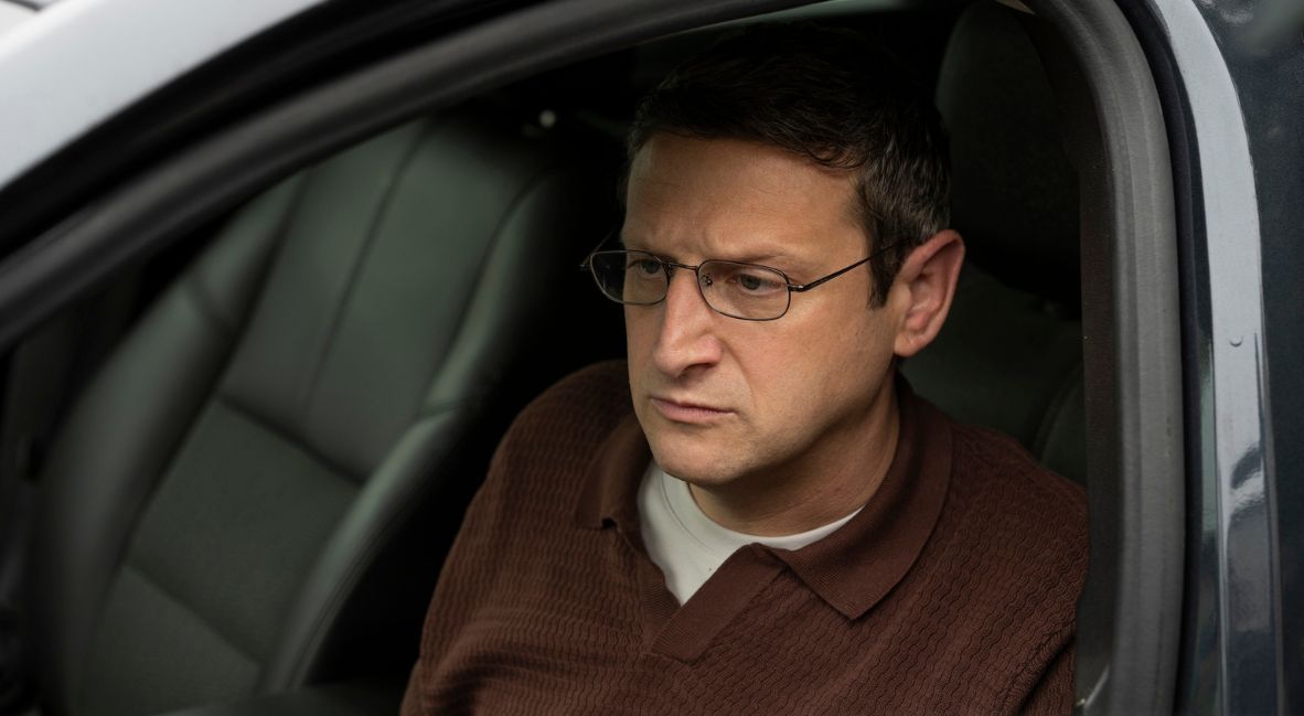 RECAP: 'The Chair Company' Episode 7 - "I said to my dog, "How do you like my hippie shirt?"" 1 Ron sits in his car as part of his investigation