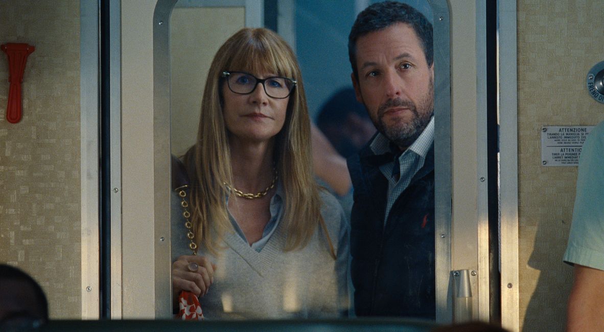 Laura Dern and Adam Sandler star as Liz and Ron in Jay Kelly 