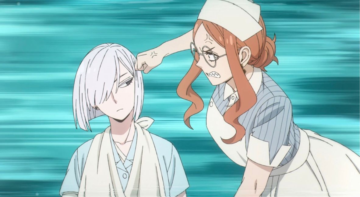 Fiona is berated by the handler. 