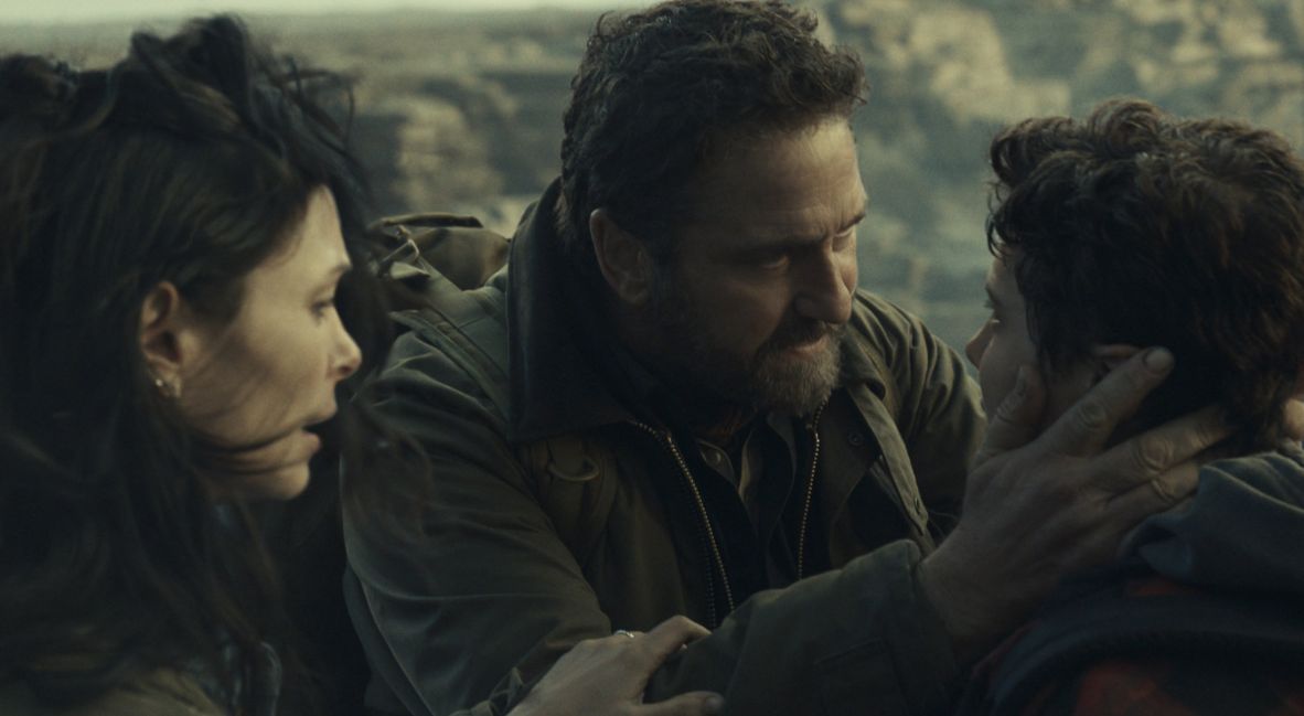 Greenland 2: Migration promotional image with Morena Baccarin and Gerard Butler