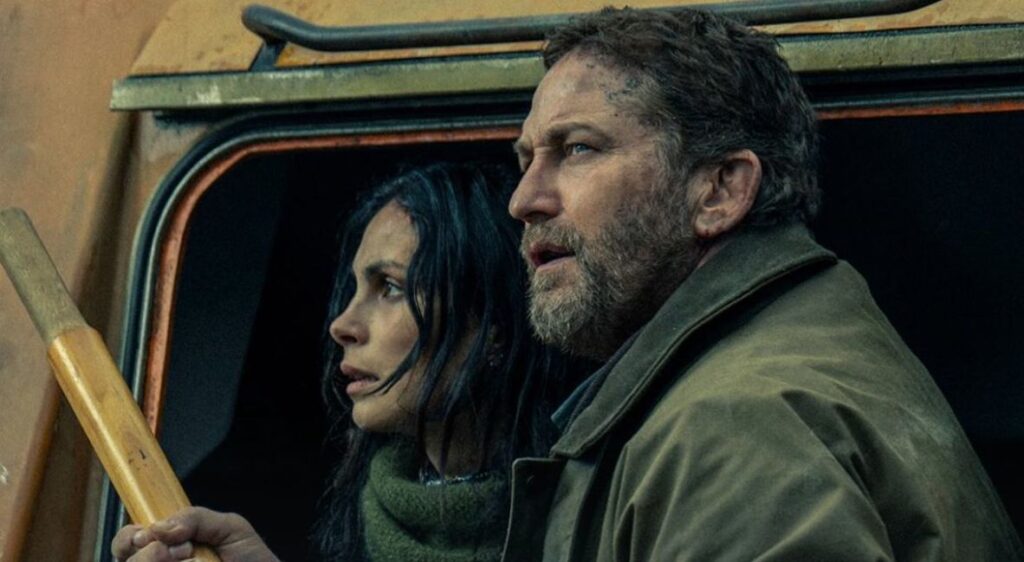 Greenland 2: Migration promotional image with Morena Baccarin and Gerard Butler