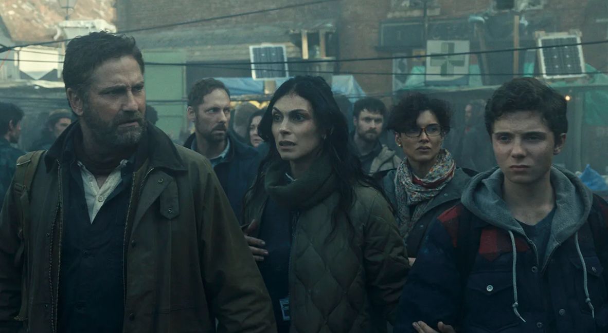 Greenland 2: Migration promotional image with Morena Baccarin and Gerard Butler