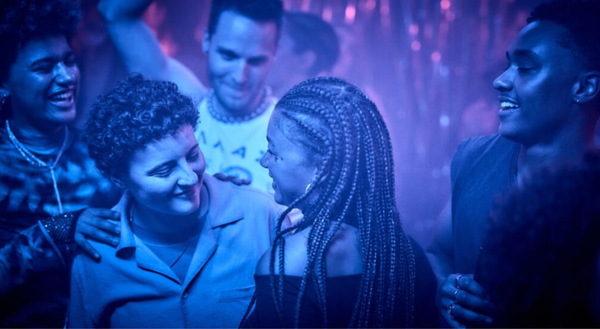 Frances at a club with friends