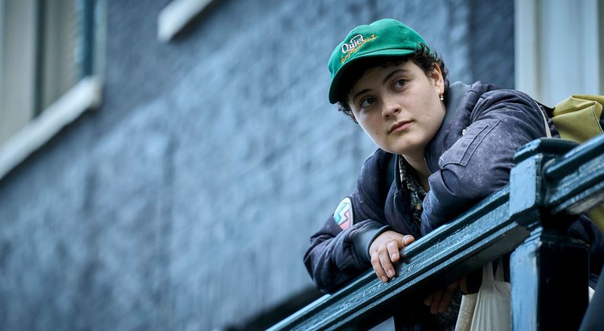 Frances looking over a railing