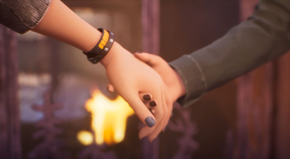 Chloe and Max hold hands 