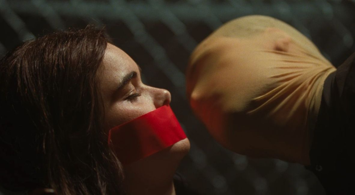 Margot is threatened by Arthur