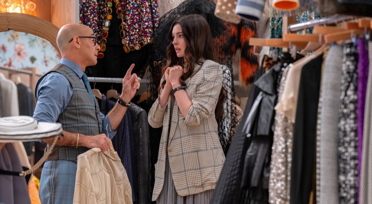 Nigel and Andy picks out clothes for her to borrow