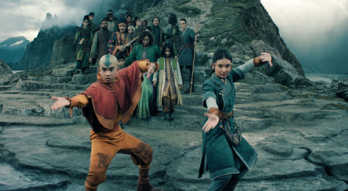 Aang and Katara leading a group of people