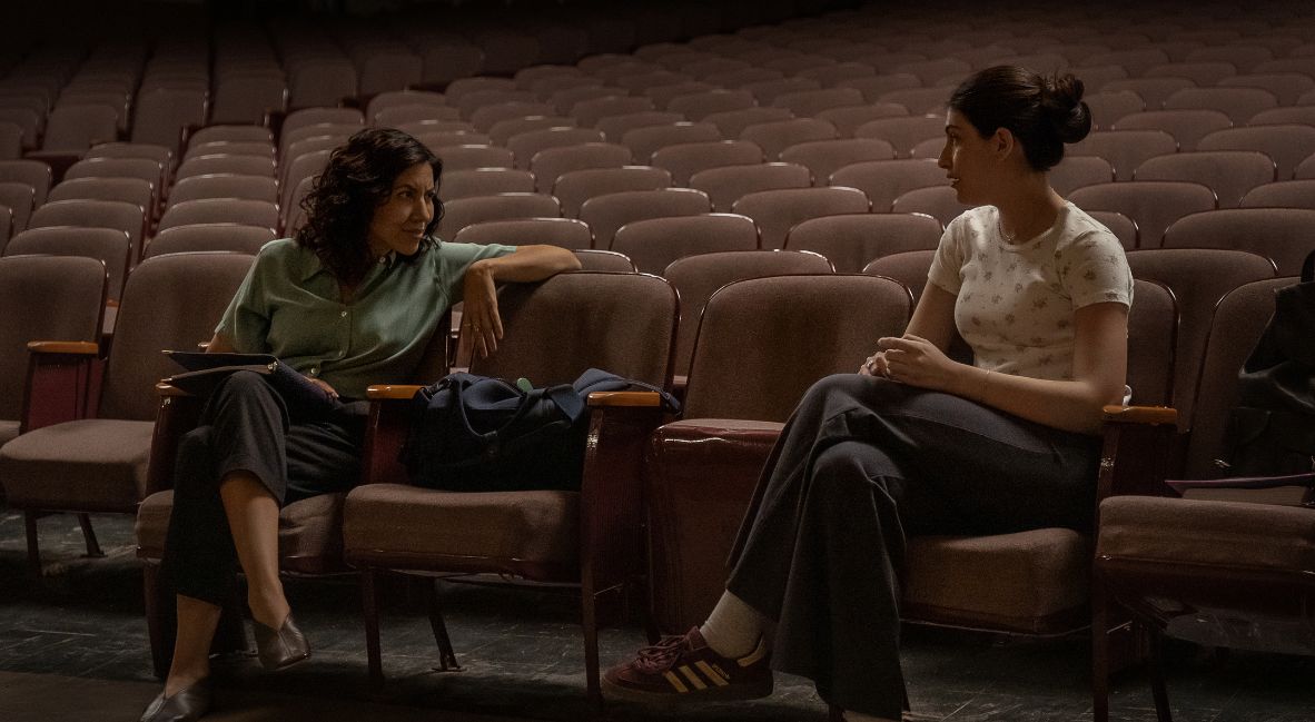 Sophie talks with her teacher who is directing the musical