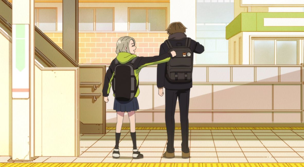 Azuma slaps Taira on the back
