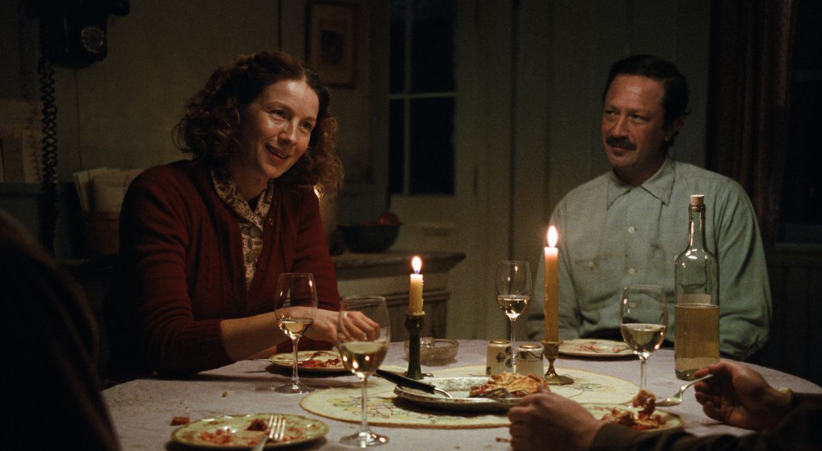 Louise and Lester sit at the dinner table