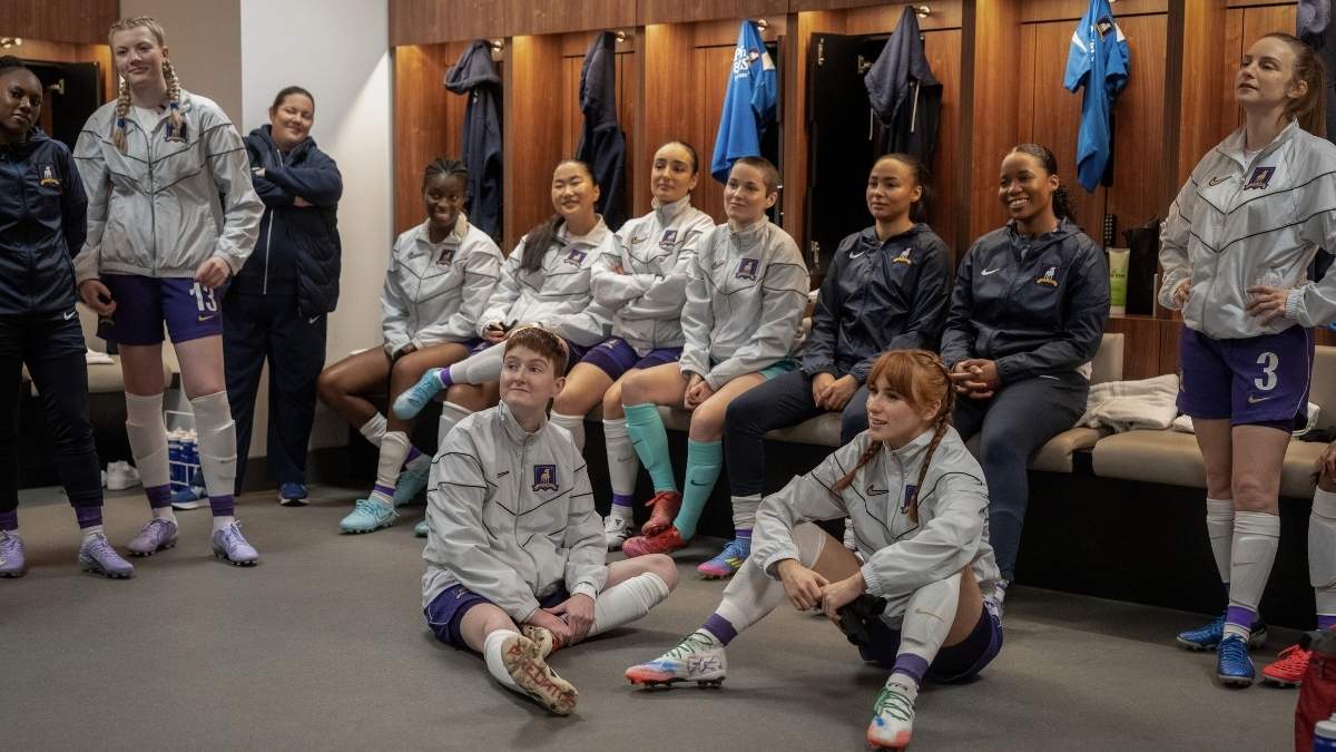 Elizabeth Falola, Karesha Iton, Terri Olejnik, Lauren Hendricks, Annelise Heywood, Mercedes Assad, Jude Mack, Abbie Hern, Shannon Hayes, Faye Marsay, Rex Hayes and Aisling Sharkey in Ted Lasso Season 4 Episode 9