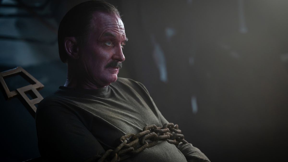 Sinestro tied up in the cave Hal took him to