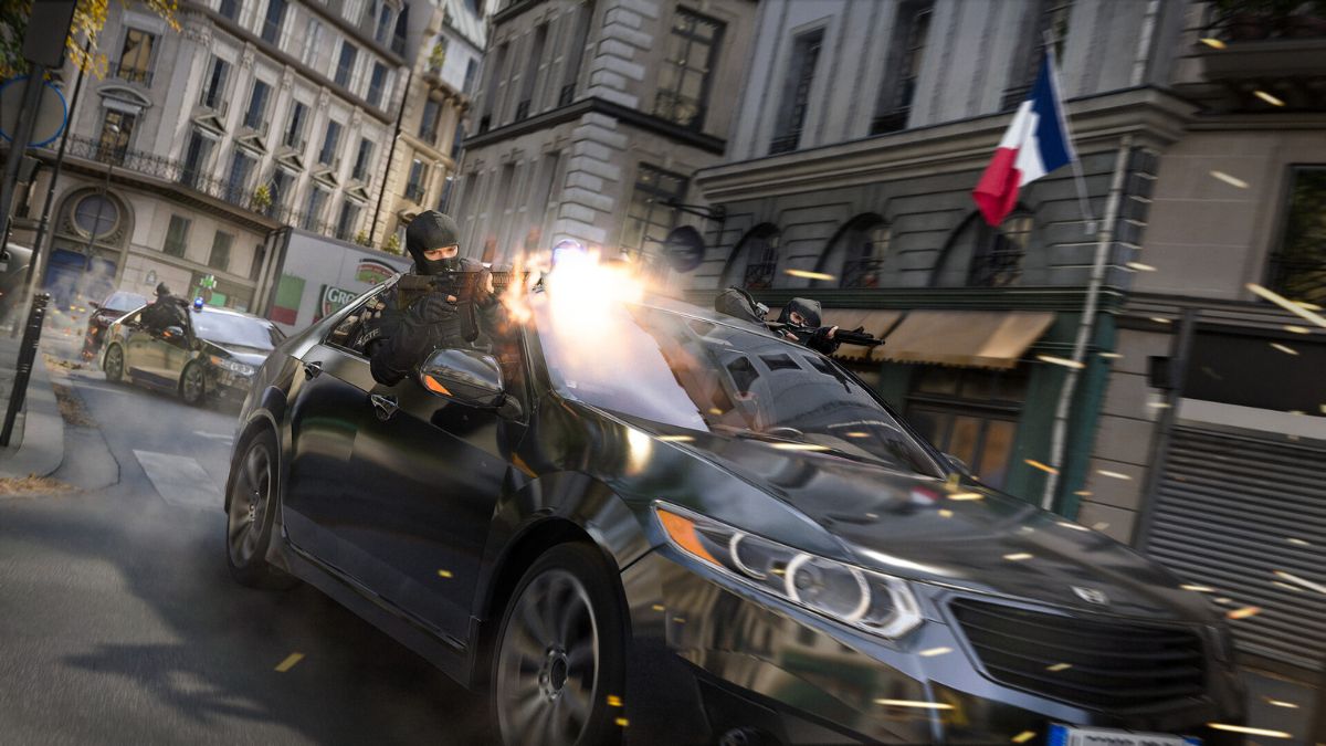 A character leans out of a car while firing a gun